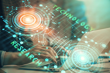 Businessman with computer background with technology theme hologram. Concept of big data. Double exposure.