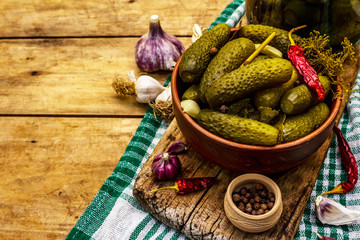 Marinated pickled cucumbers with spices and herbs