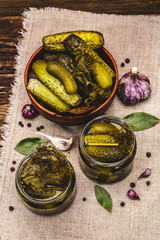 Marinated pickled cucumbers with spices and herbs