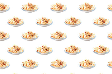 Popcorn seamless pattern on a glass plate on a white background