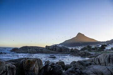 sunrise over the sea and mountains