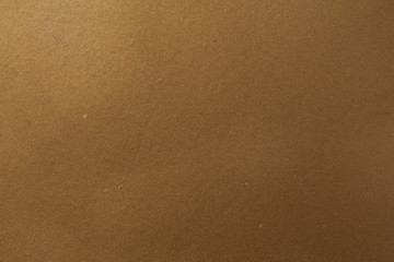 Dark gold background. Painted surface texture