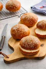 Fresh homemade burger buns with sesame. Copy space.