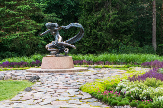 Sculpture "Egle, the Queen of Serpents" (1960, sculptor Robertas Antinis) in Palanga Botanical Garden, Palanga, Lithuania