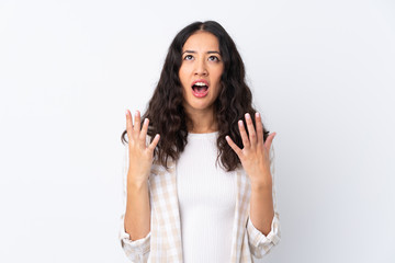 Mixed race woman over isolated white background frustrated by a bad situation