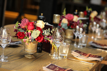 Flower Decore for an event with afternoon light hitting the table.