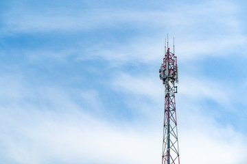 Telecommunication tower of 4G and 5G cellular. Macro Base Station. Wireless Communication Antenna Transmitter. Telecommunication steel high tower with antennas against blue sky.