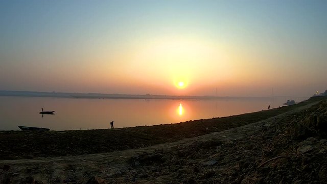 Sun rise in Varanasi over the Ganges, time lapse
