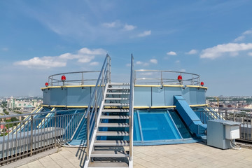 helipad on the roof of a high-rise building in the city center