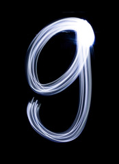 Number 9 nine, made with photo light painting technique isolated on black. Set of bright glowing numbers hand drawing with light