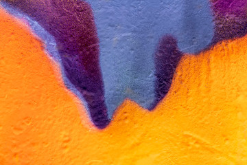 Art under ground. Beautiful street art graffiti background. The wall is decorated with abstract drawings house paint. Modern style urban culture of street youth. Abstract picture on wall