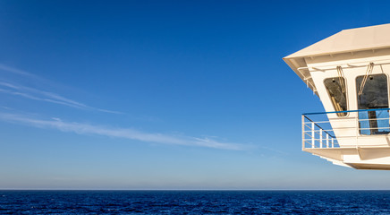 Fototapeta premium Panoramic photo from the outside of a Ferry between the Canary Islands, Spain and Huelva, Spain. Ship's skyline and command bridge photo