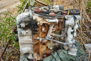close up of an old rusty  car engine