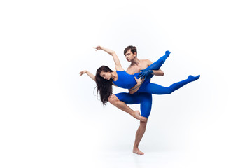 Target. Couple of modern dancers, art contemp dance, blue and white combination of emotions. Flexibility and grace in motion and action on white studio background. Fashion and beauty, artwork concept.