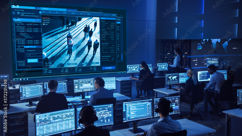 Poster team of professional cyber security data science engineers work on surveillance tracking shot of peo