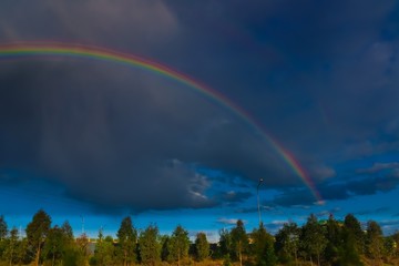 Colourful rainbow over Country side in Sydney NSW Australia