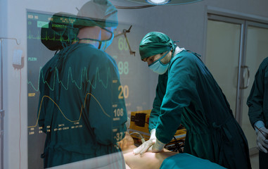 Another surgery. Surgery medical team operating in a surgery room of the hospital mature surgeon leading an operation profession professionalism occupation teamwork medical people doctors concept