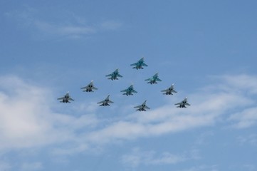Tactical wing consisting of a group of su-30SM and su-35S fighters and SU-34 bombers in the sky over Moscow during the dress rehearsal of the Victory parade