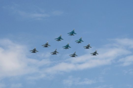 Tactical wing consisting of a group of su-30SM and su-35S fighters and SU-34 bombers in the sky over Moscow during the dress rehearsal of the Victory parade