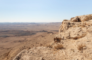 Sunrise  over the Judean Desert. View from the top of the cliff near Mitzpe Ramon in Israel