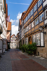 well-preserved historic half-timbered house facades in the old city center of Hamelin