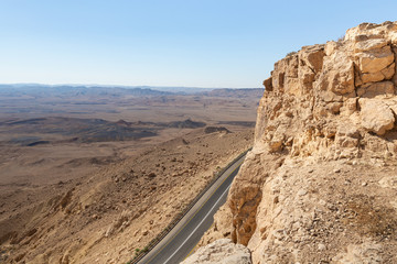 Sunrise  over the Judean Desert. View from the top of the cliff near Mitzpe Ramon in Israel © svarshik