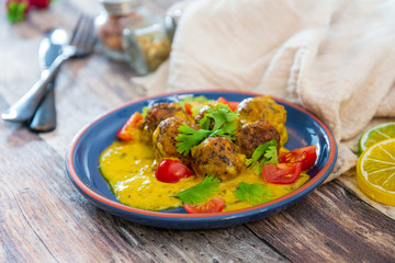 6 vegetable balls and quinoa , curry coconut cream