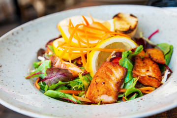 Grilled Salmon with fresh lettuce and mash potatoes