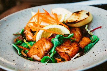 Grilled Salmon with fresh lettuce and mash potatoes