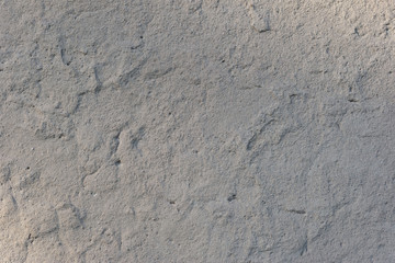texture of gray concrete wall, with elements of abstraction. Copy space, pattern, blank
