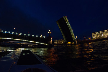 Fototapeta na wymiar Panorama of St. Petersburg at night. Cities of Russia. Petersburg bridges. Summer in St. Petersburg. Travel across Russia. Breeding the bridge.