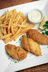 british traditional fish and chips meal on plate
