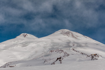 Fototapeta na wymiar snow-capped peaks of Elbrus