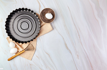 Flat lay with baking utensils and cooking ingredients for tarts, cookies, dough and pastry