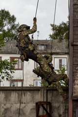 Special forces soldiers storm the walls