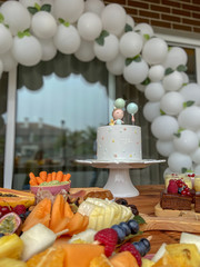 First Anniversary Party. Balloons, food and cake for children's birthday. The first birthday of the baby. Modern Vintage Decor for children's birthday. Birthday party concept.