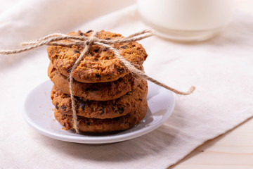 homemade oatmeal cookies on rustic background