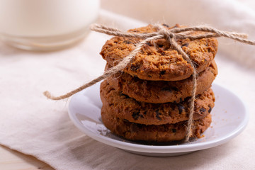 homemade oatmeal cookies on rustic background
