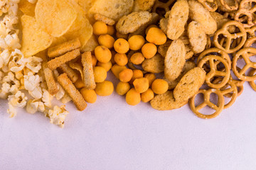 Junk food. A lot of junk food on a white background.
Copy space.