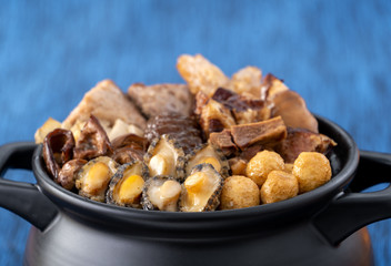 Traditional food of Chinese lunar new year, Buddha jumps over the wall, Chinese Soup Casserole dish, Buddha's Temptation, named Fo Tiao Qiang, close up.