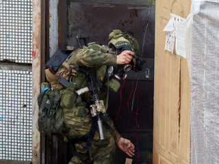 Special forces soldiers storm the building