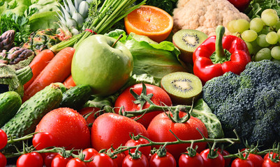 Naklejka na ściany i meble Assorted raw organic vegetables and fruits