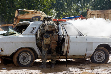 Special forces soldiers storm the car