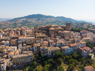 Fototapeta na wymiar Tricarico town, province of Matera, Basilicata, southern Italy. It is home to one of the best preserved medieval historical centres in Italy. aerial view of tricarico with its Norman tower
