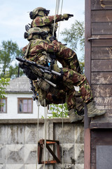 Special forces soldiers storm the walls