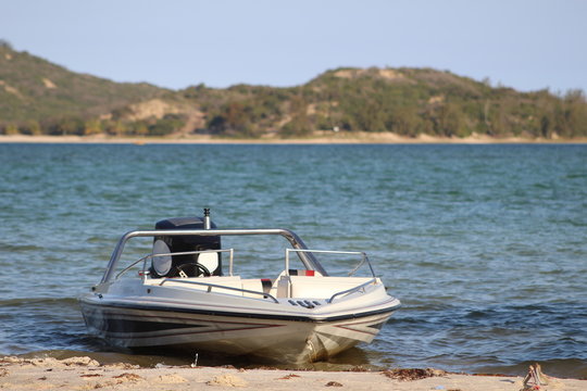 Bilene, Gaza, Mozambique - August 2020 - Motorboat in Bilene Lagoon, Mozambique. Lagoon near the sea. very clean lagoon and clean sand 