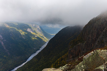 fog in the mountains in summer with a view down the valley