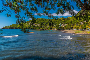 Fototapeta na wymiar A view across the bay from the estuary of the Buccament river in Saint Vincent