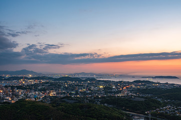 Fototapeta na wymiar 火の山公園から眺める夏の下関市街地と響灘の夕暮れ
