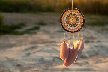 Handmade dream catcher with feathers threads and beads rope hanging